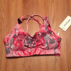 Size small pink yoga bra with crisscrossing straps